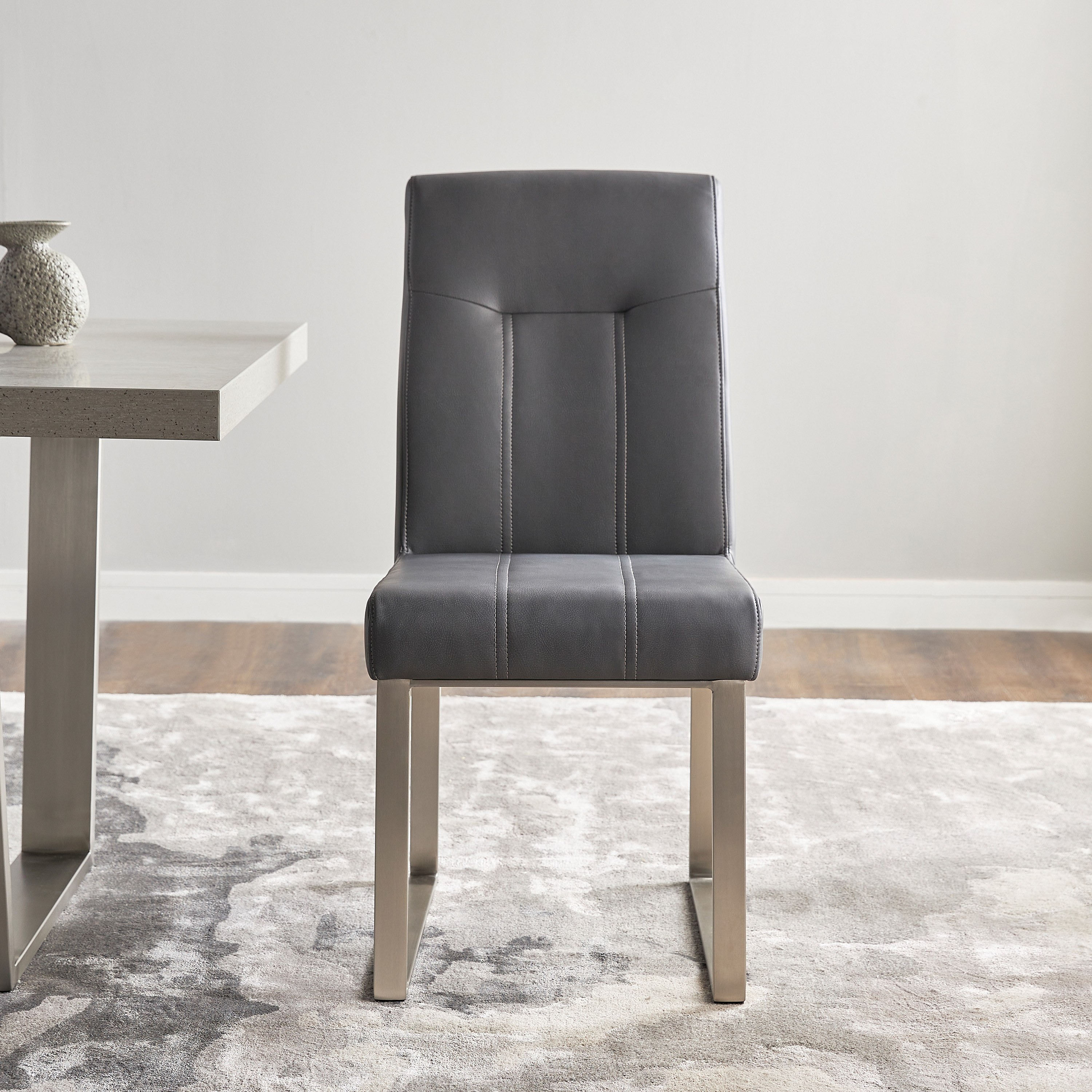 Gray leather store dining chairs