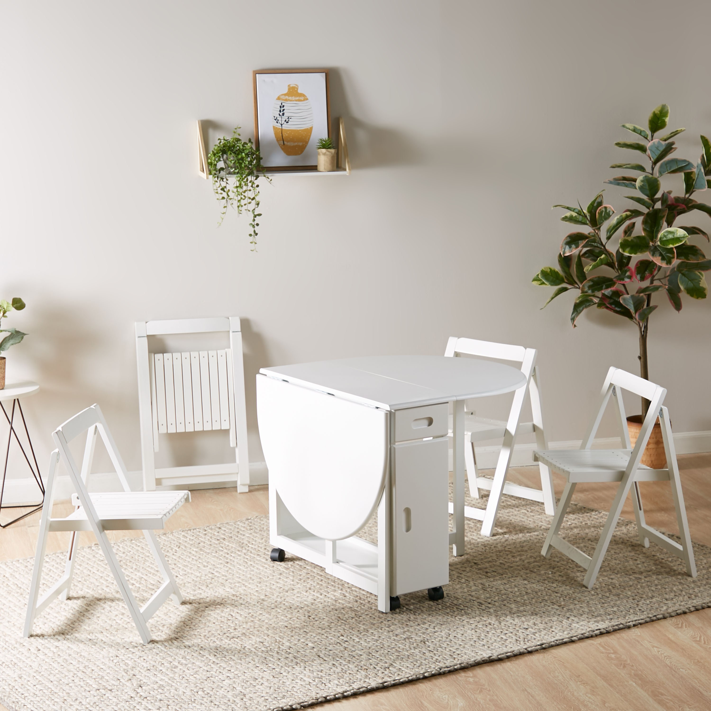 Butterfly drop leaf table store with 4 foldable chairs