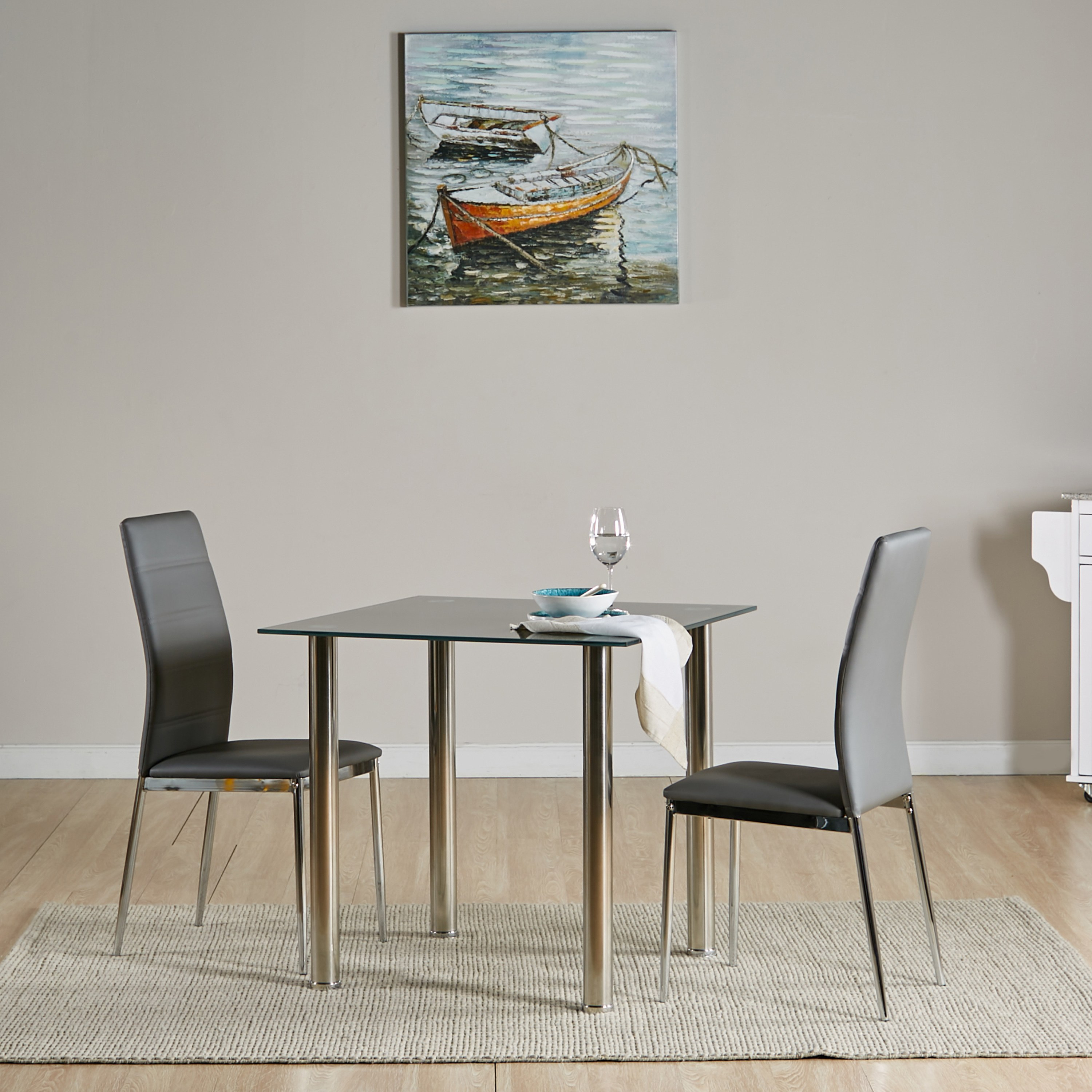 Glass dining table and 2 deals chairs