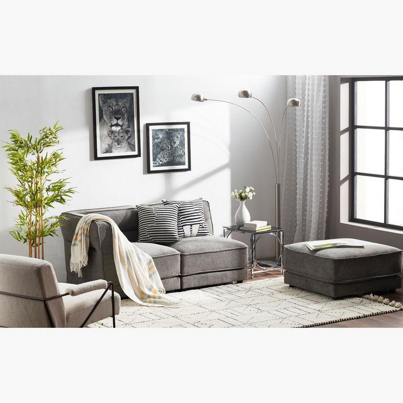 Levin Fabric Armless Sofa Online