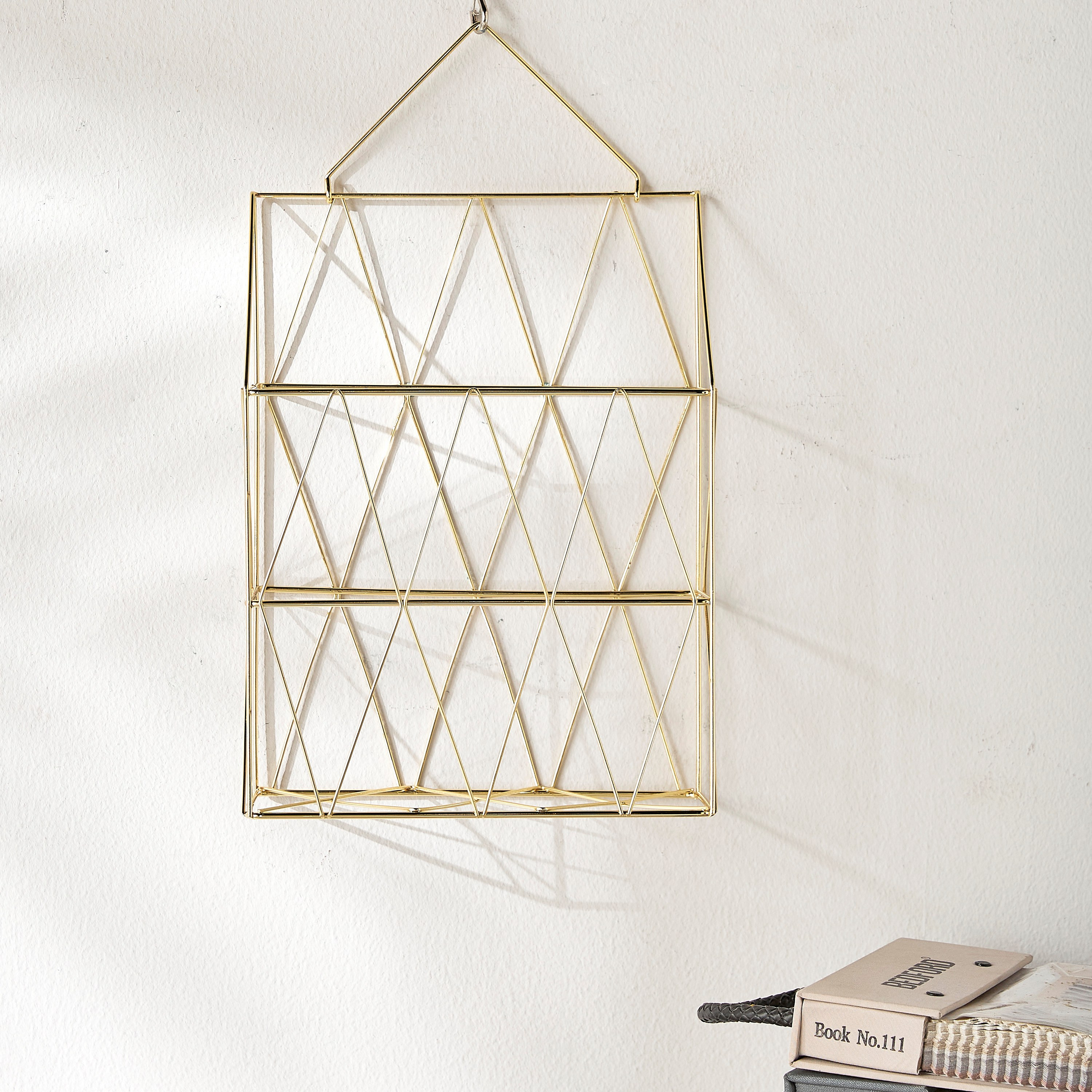 Gold wall mounted magazine rack sale