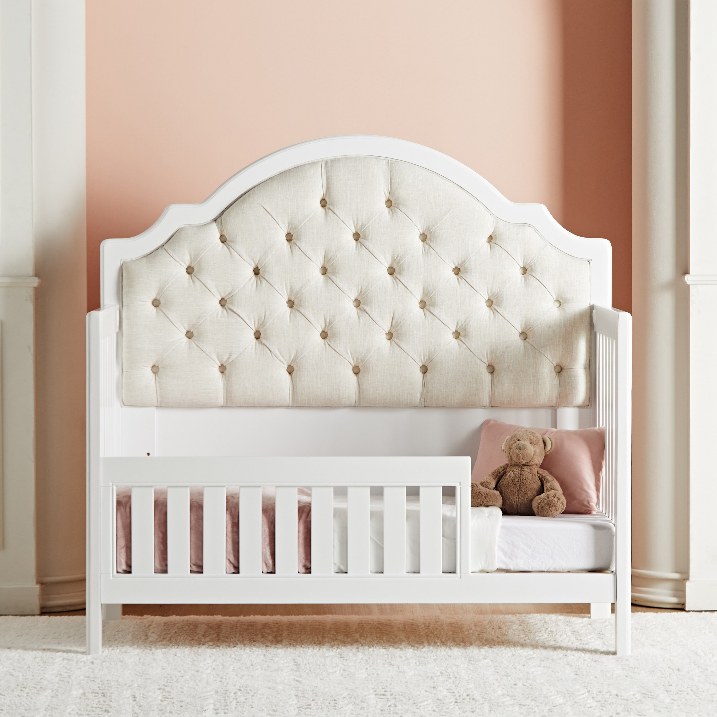 Crib with shop tufted headboard