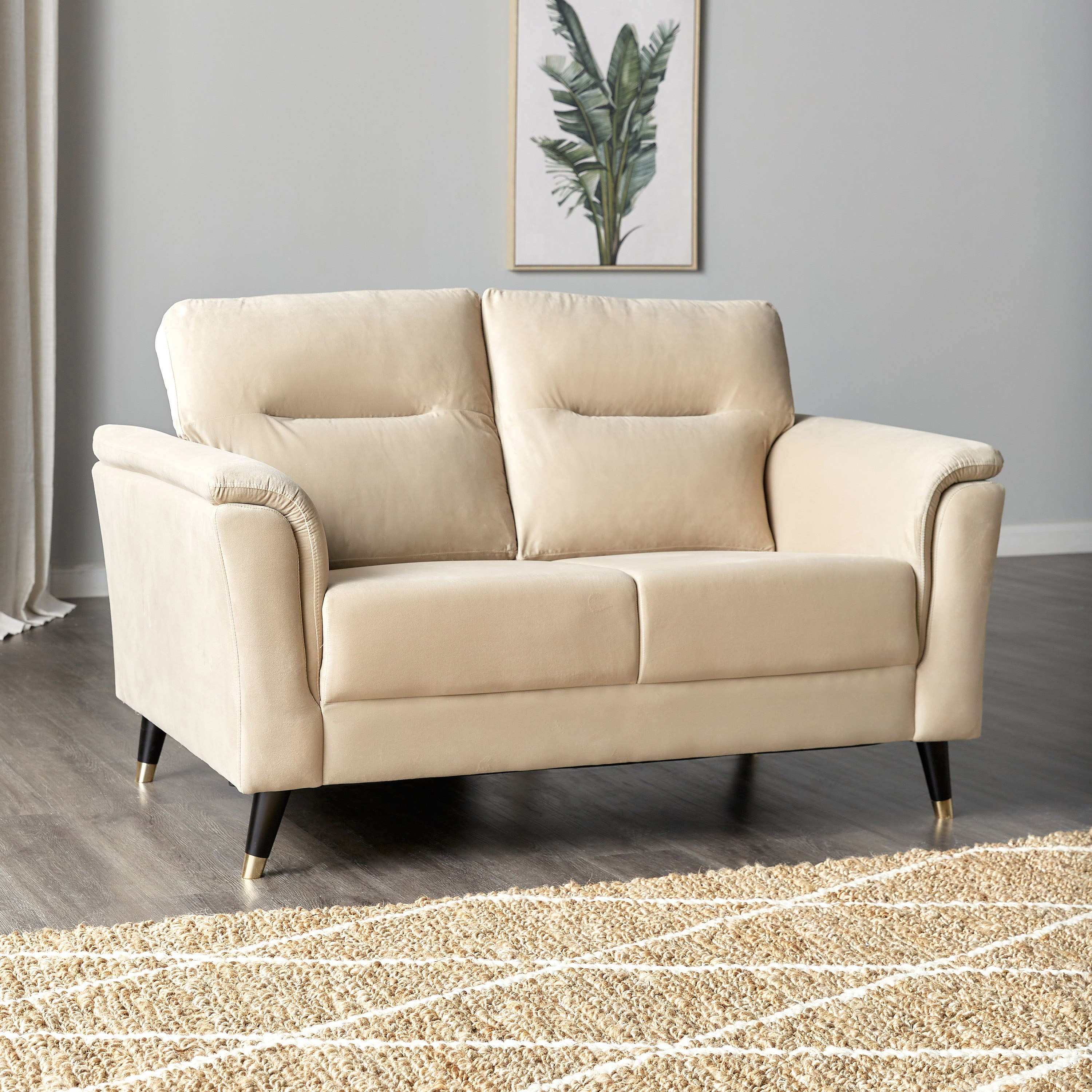 Beige two deals seater sofa