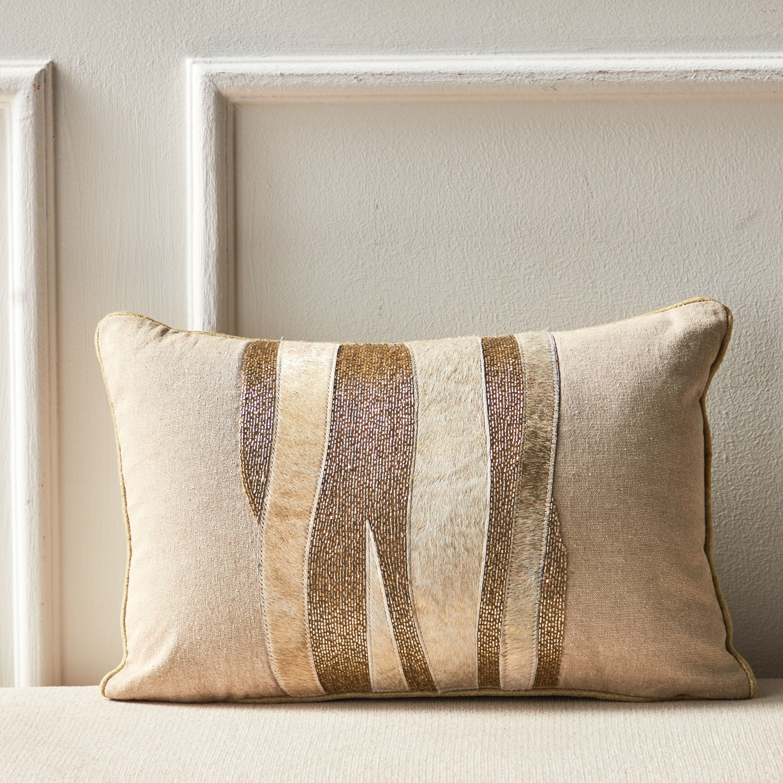 Gold and hot sale cream cushions