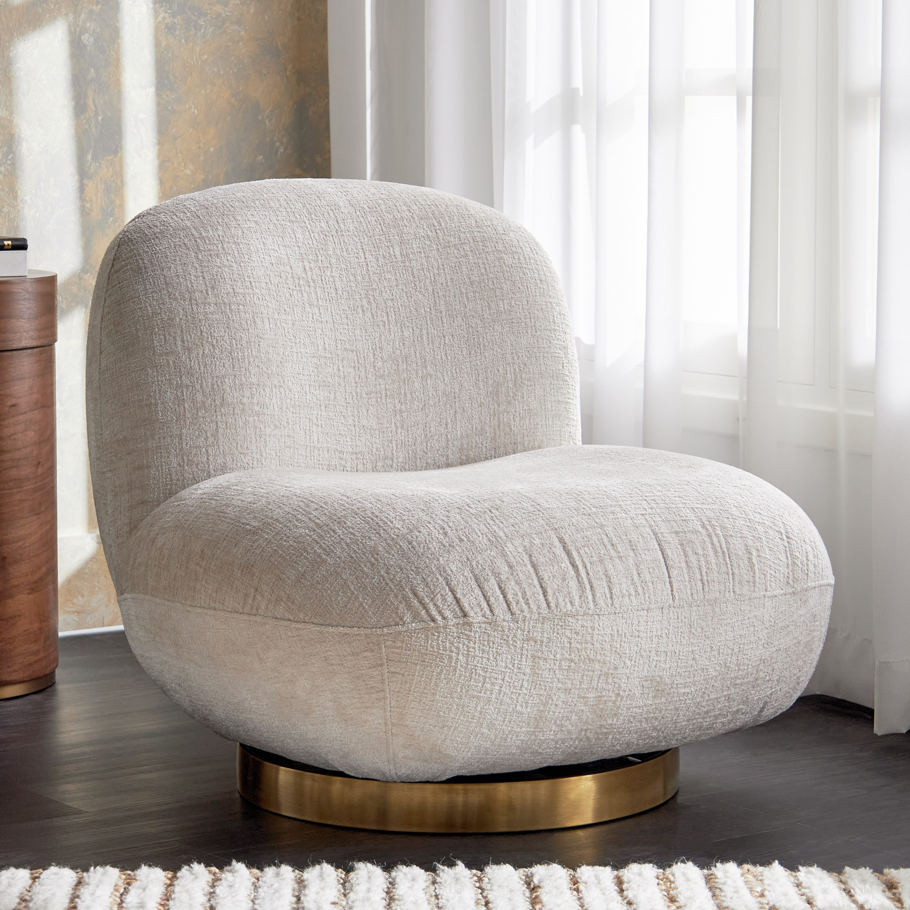 Nomad Swivel Fabric Armchair