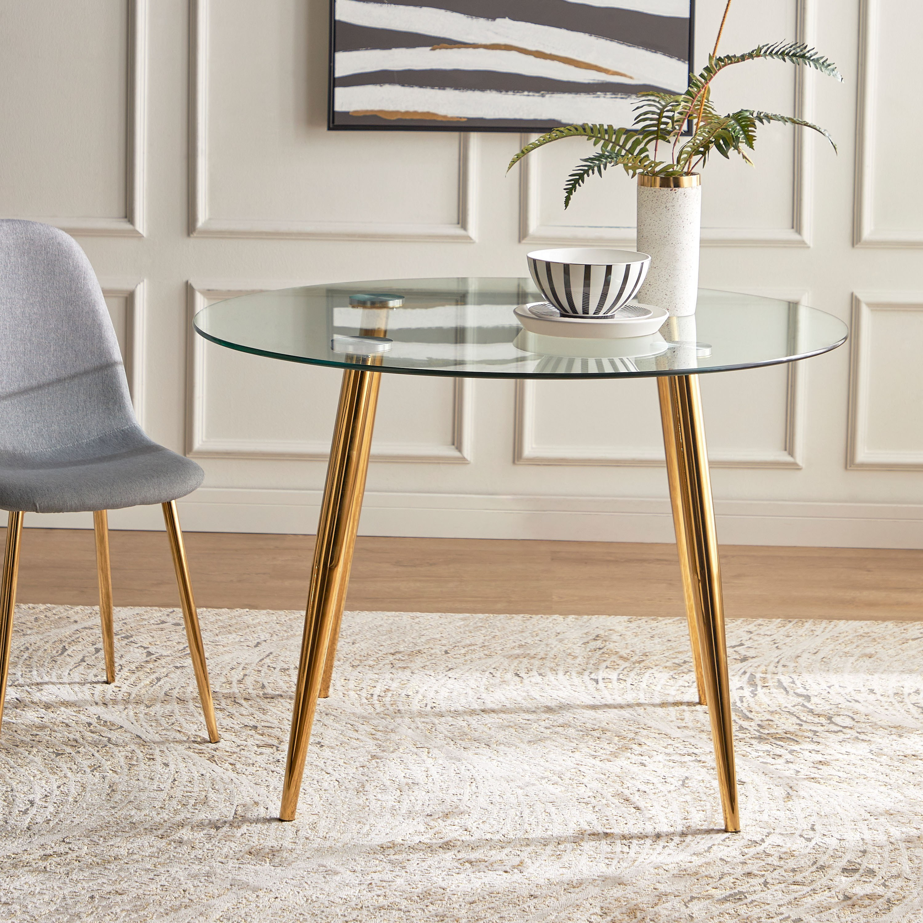 Round glass dining table store with gold base