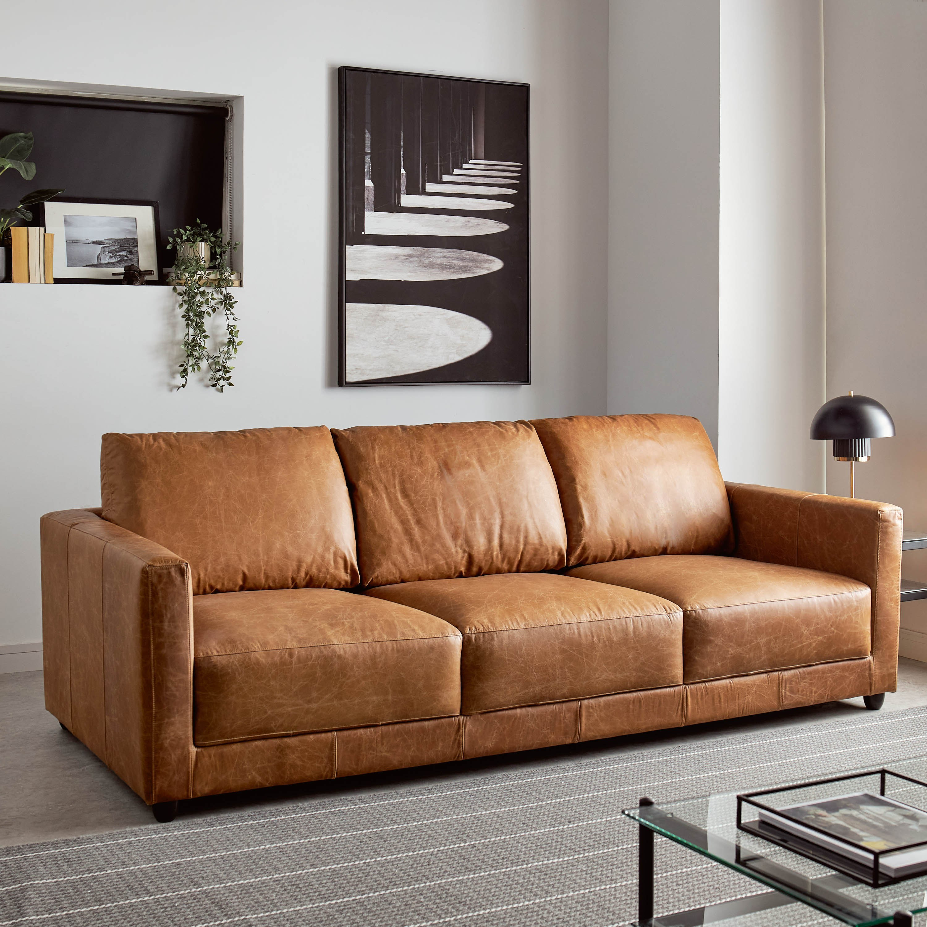 Three seater leather deals couch