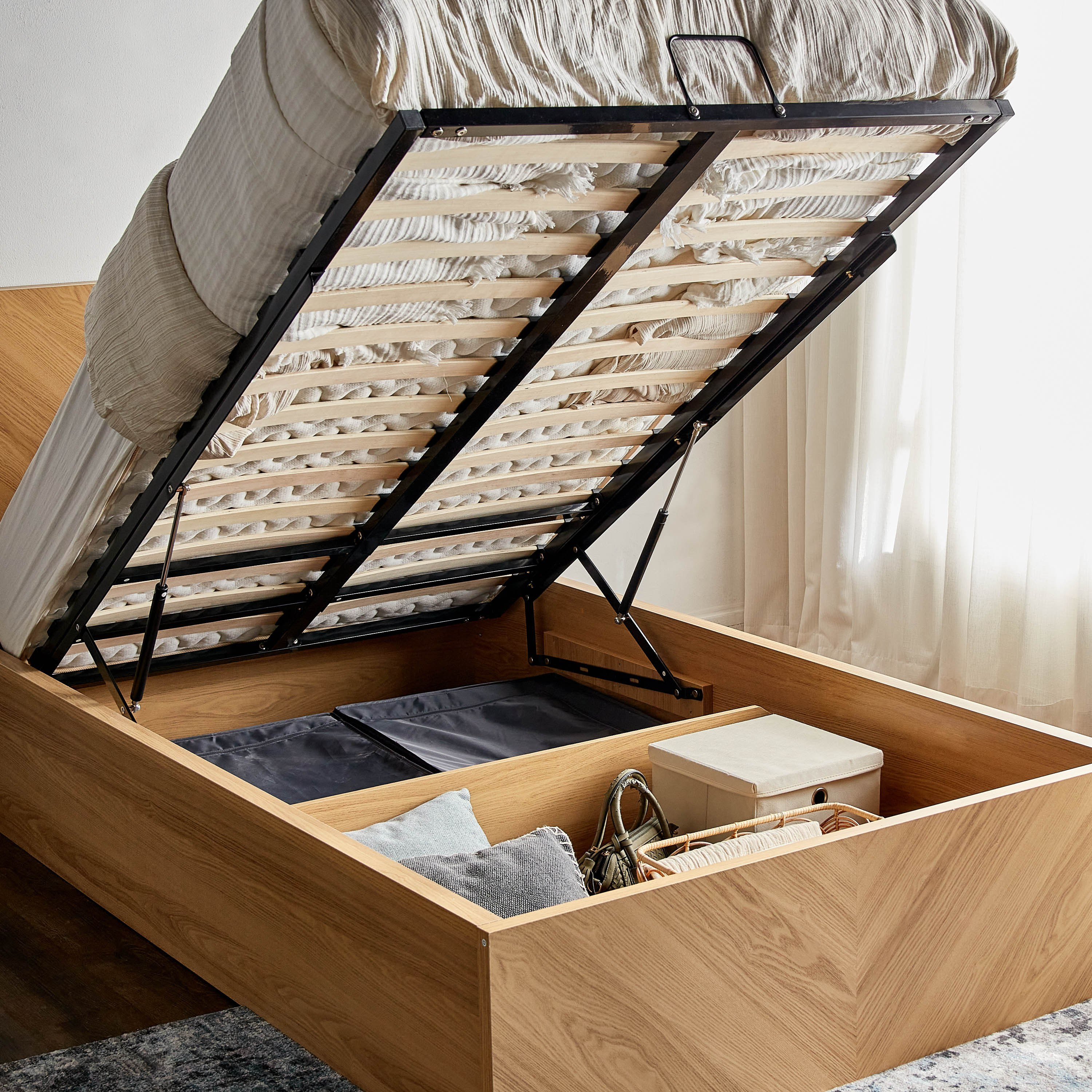 Single lift store up bed